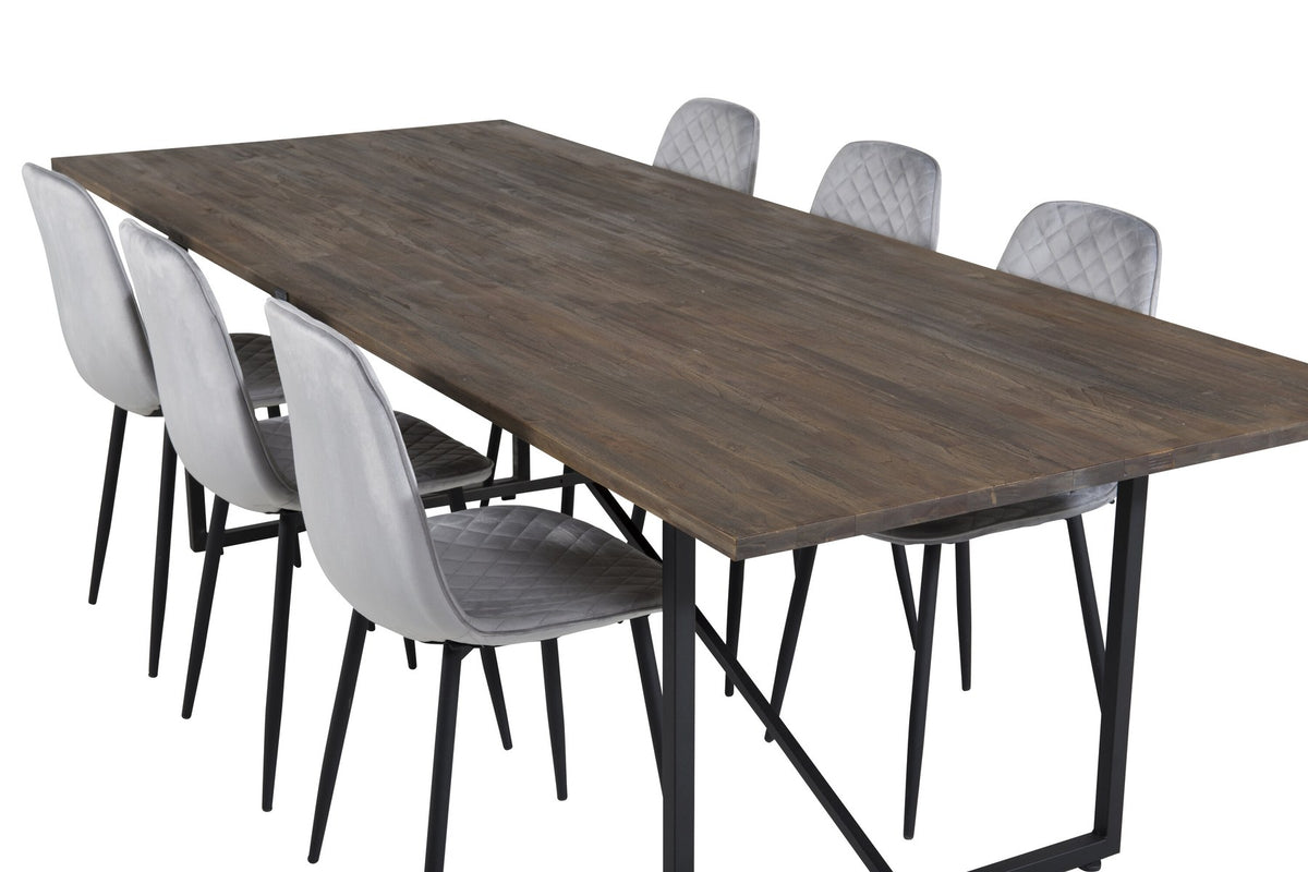 Esstisch mit Teak-Tischplatte in Natur und Stahlgestell, dazu Stühle mit schwarzem Stahlrahmen und grauem Polyester-Samt-Bezug.