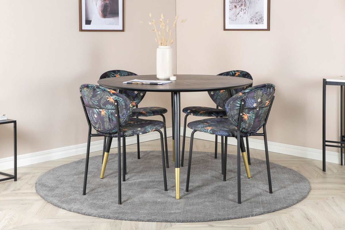 Schwarzes Esszimmerset Dipp mit Vault Stühlen: Tisch mit MDF-Furnierplatte und Stahlbeinen, Stühle mit Polsterbezug und Stahlgestell.