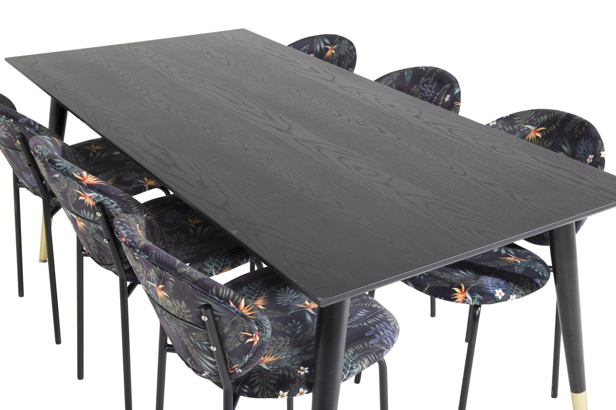 Schwarzes Esszimmerset Dipp mit Vault Stühlen: Tisch mit MDF-Furnierplatte und Stahlbeinen, Stühle mit Polsterbezug und Stahlgestell.