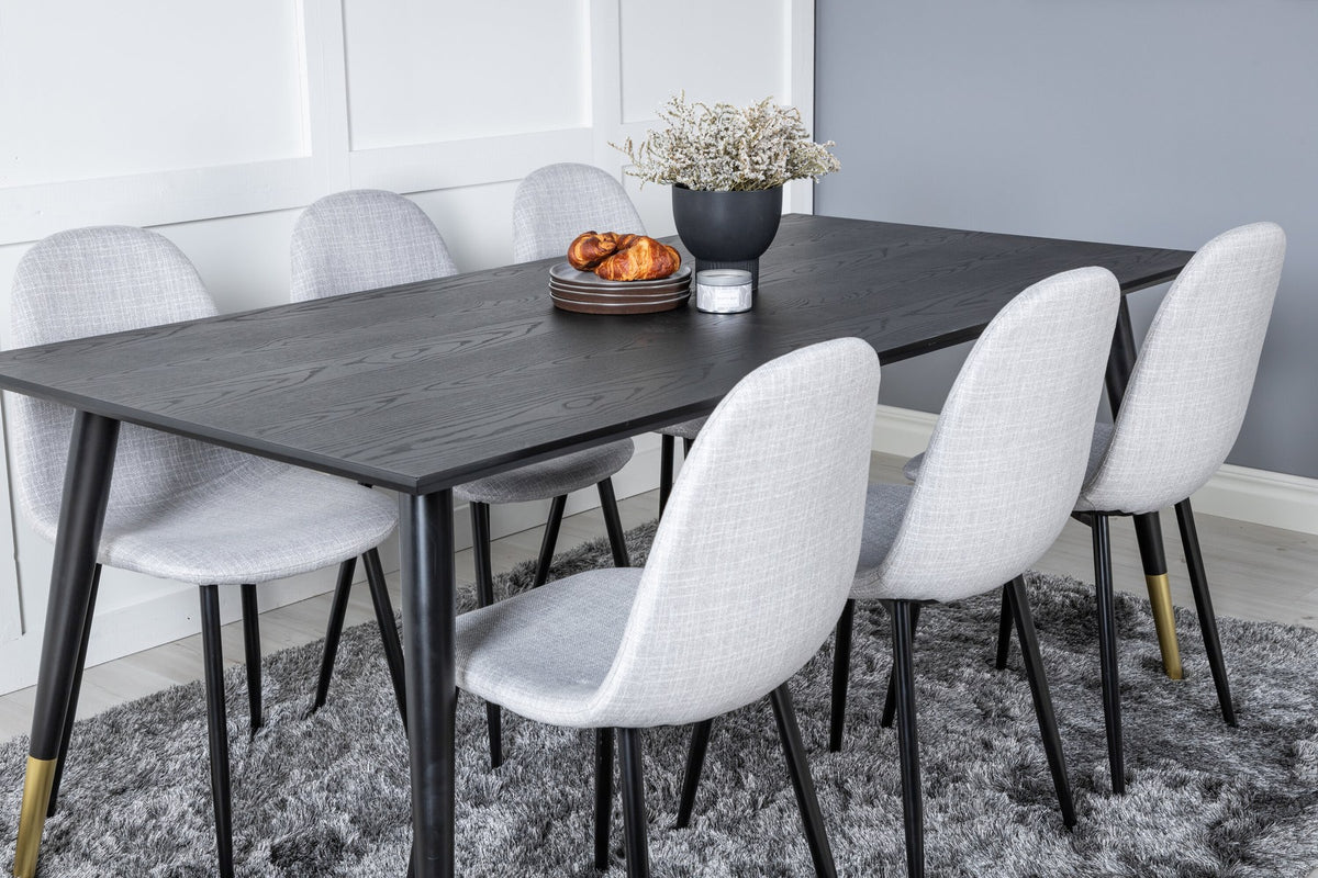 Esszimmerset Dipp mit schwarzem Esstisch aus MDF und Stahl, 180x90 cm, sowie 6 Polar-Stühlen mit hellgrauem Stoffbezug und schwarzen Beinen
