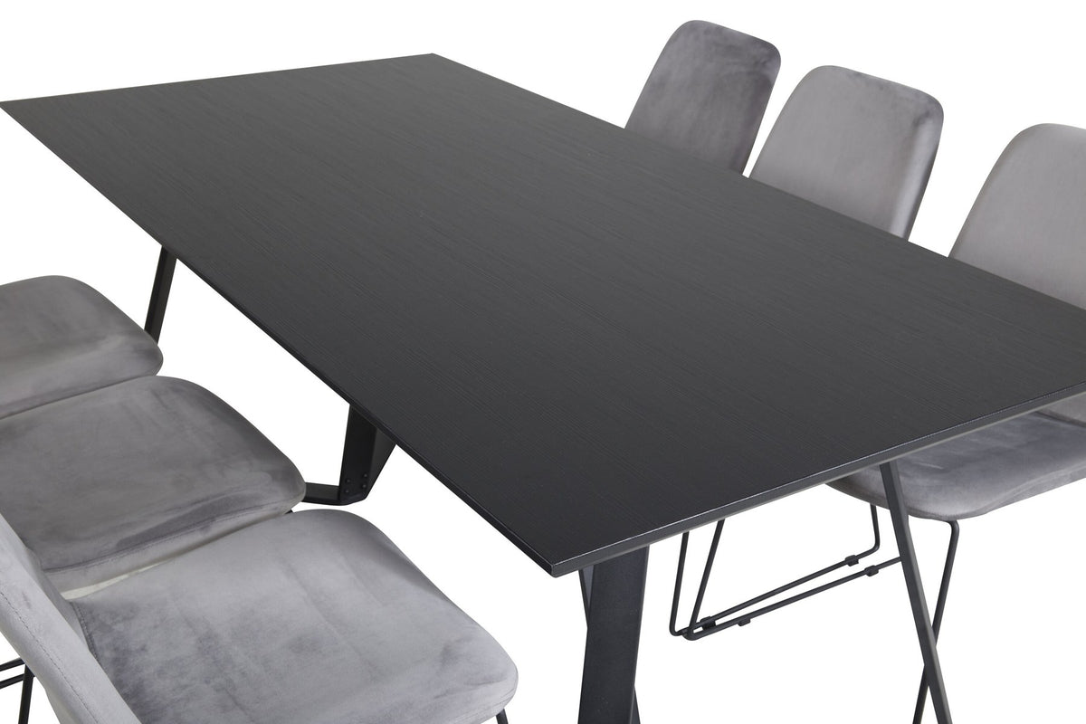 Zwei graue Esszimmerstühle mit schwarzem Stahlgestell und rechteckiger Esstisch aus MDF mit schwarzer Tischplatte, 180x90 cm.