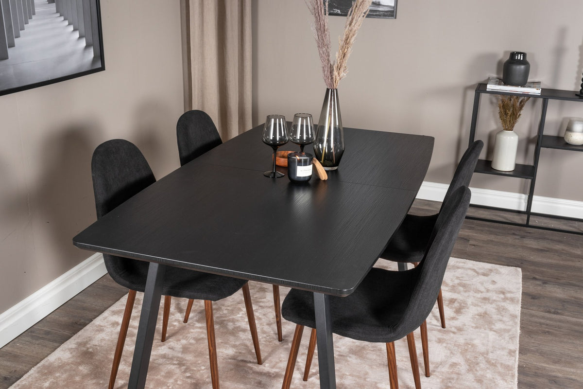 Schwarzes Inca Esszimmerset von Venture Home: ausziehbarer Tisch aus MDF, Sperrholz und Stahl mit sechs passenden Stühlen der Serie Polar