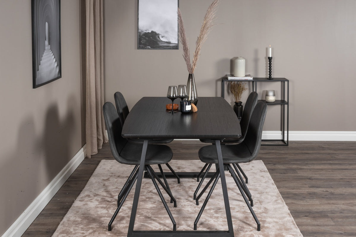 Schwarzes Inca Esszimmerset von Venture Home: ausziehbarer Tisch aus MDF, Sperrholz und Stahl mit sechs passenden Stühlen der Serie Polar