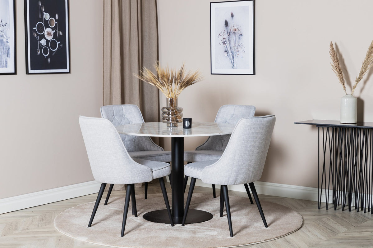 Rundes Esszimmerset Estelle mit schwarzer Marmortischplatte und gebürstetem Messinggestell, dazu vier Velvet Deluxe Stühle in moosgrünem Samt.