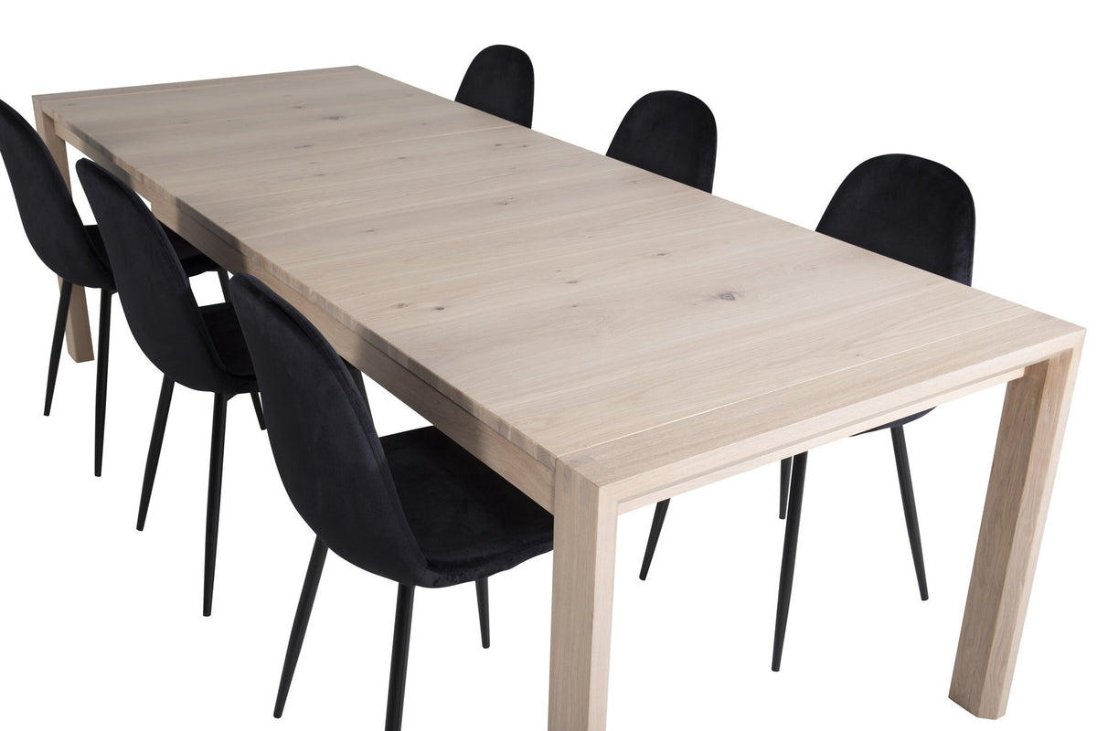 Esszimmerset aus Eiche mit weiss lasierter, rechteckiger Tischplatte und zwei schwarzen Stühlen mit pulverbeschichtetem Gestell von Venture Home