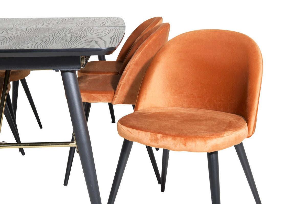 Esszimmerset mit schwarzer MDF-Tischplatte, Stahlbeinen und sechs Velvet-Stühlen in Rostorange mit schwarzem Metallgestell.