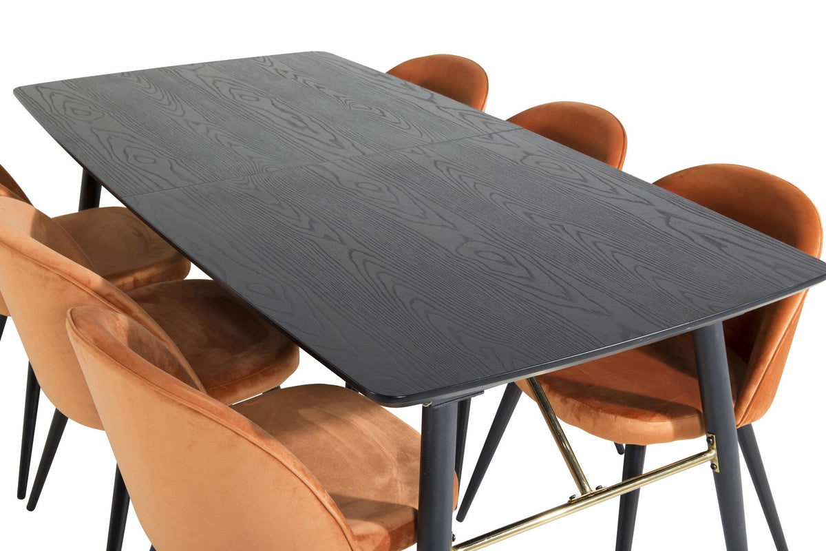 Esszimmerset mit schwarzer MDF-Tischplatte, Stahlbeinen und sechs Velvet-Stühlen in Rostorange mit schwarzem Metallgestell.