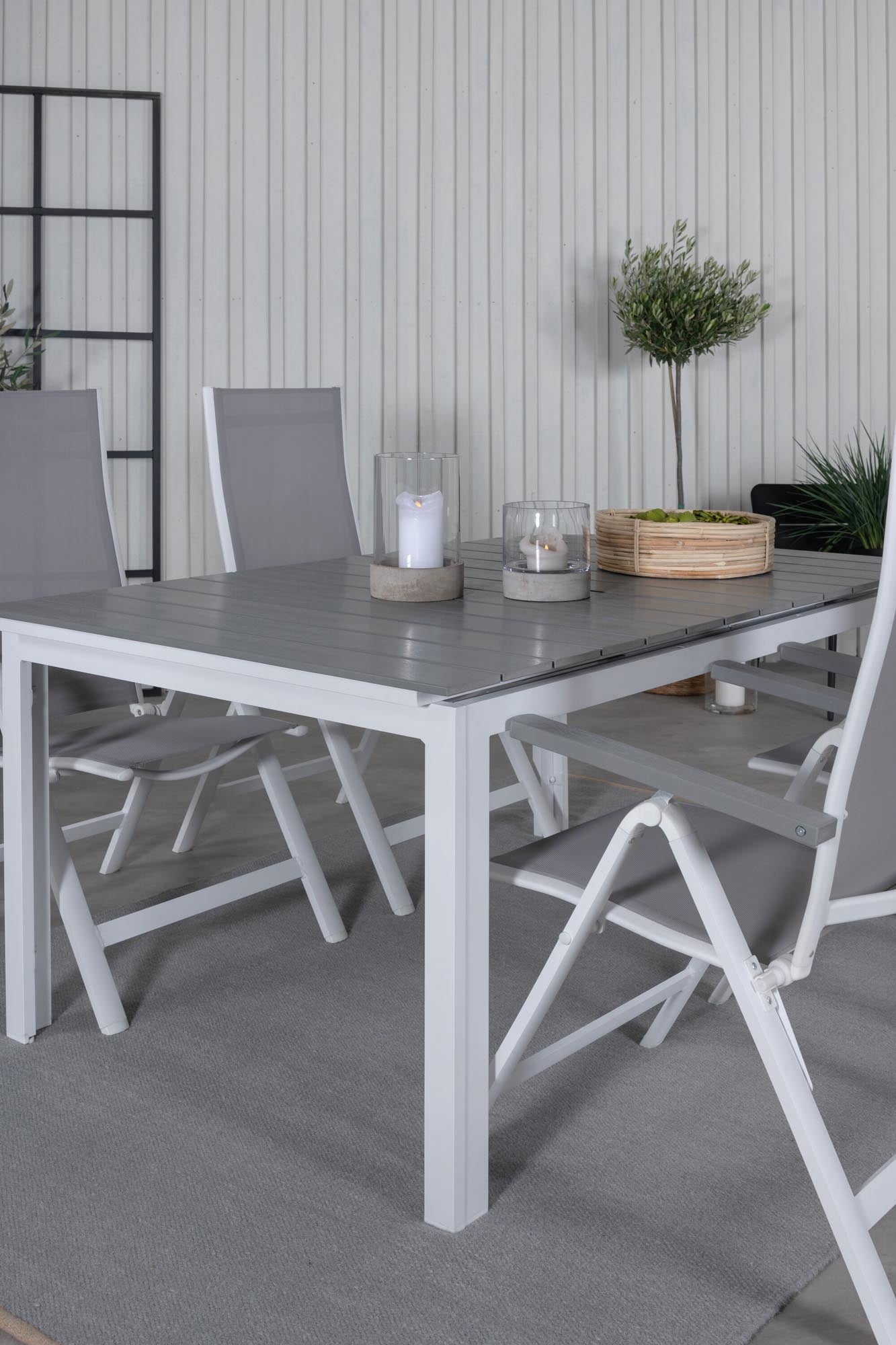 Modernes Gartentisch-Set von Venture Home, rechteckig, stilvoll und robust, perfekt für Terrasse und Garten, vielseitig nutzbar.