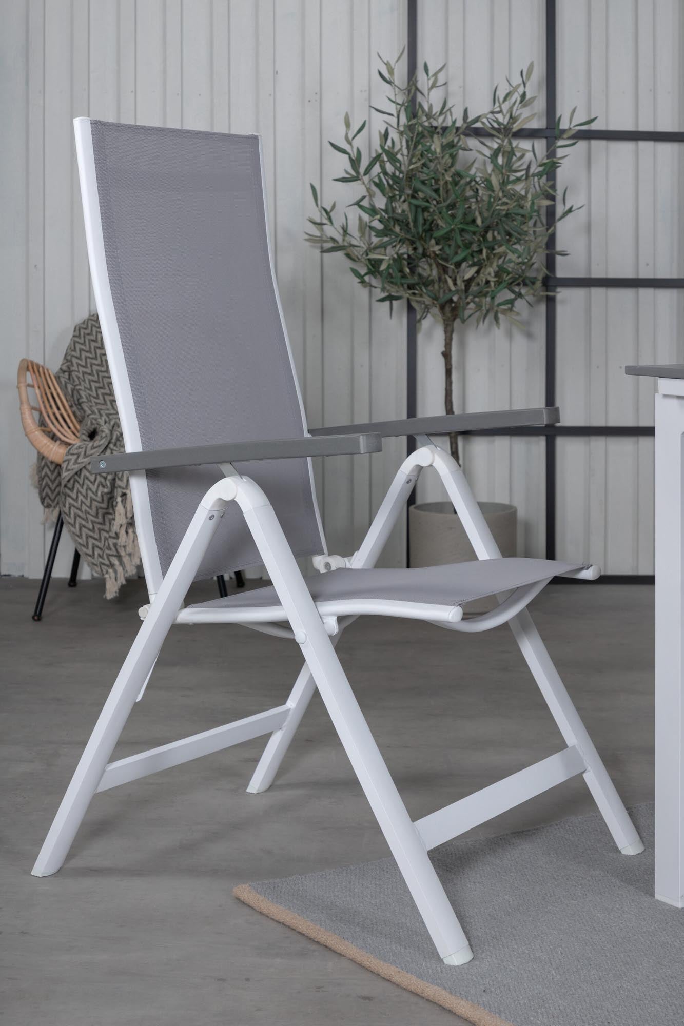 Elegantes rechteckiges Gartentisch-Set von Venture Home, ideal für Garten und Terrasse, robust, modern und vielseitig einsetzbar.