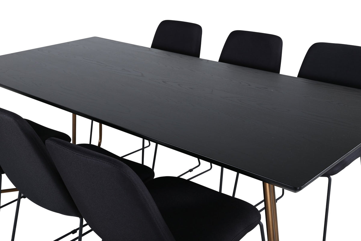Schwarzes Esszimmerset Petra von Venture Home: Esstisch mit Tischplatte aus MDF und Furnier sowie sechs Stühle Muce mit Stahlbeinen.