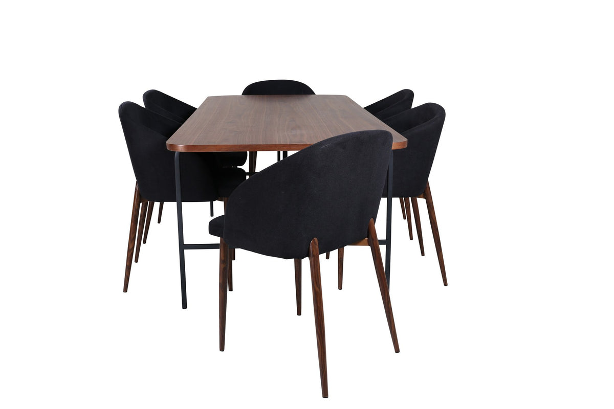 Esszimmerset Uno: rechteckiger Tisch mit MDF-Furnier-Platte in Nussbaum und schwarzem Stahlgestell, dazu Arch Stühle mit Polyesterbezug.