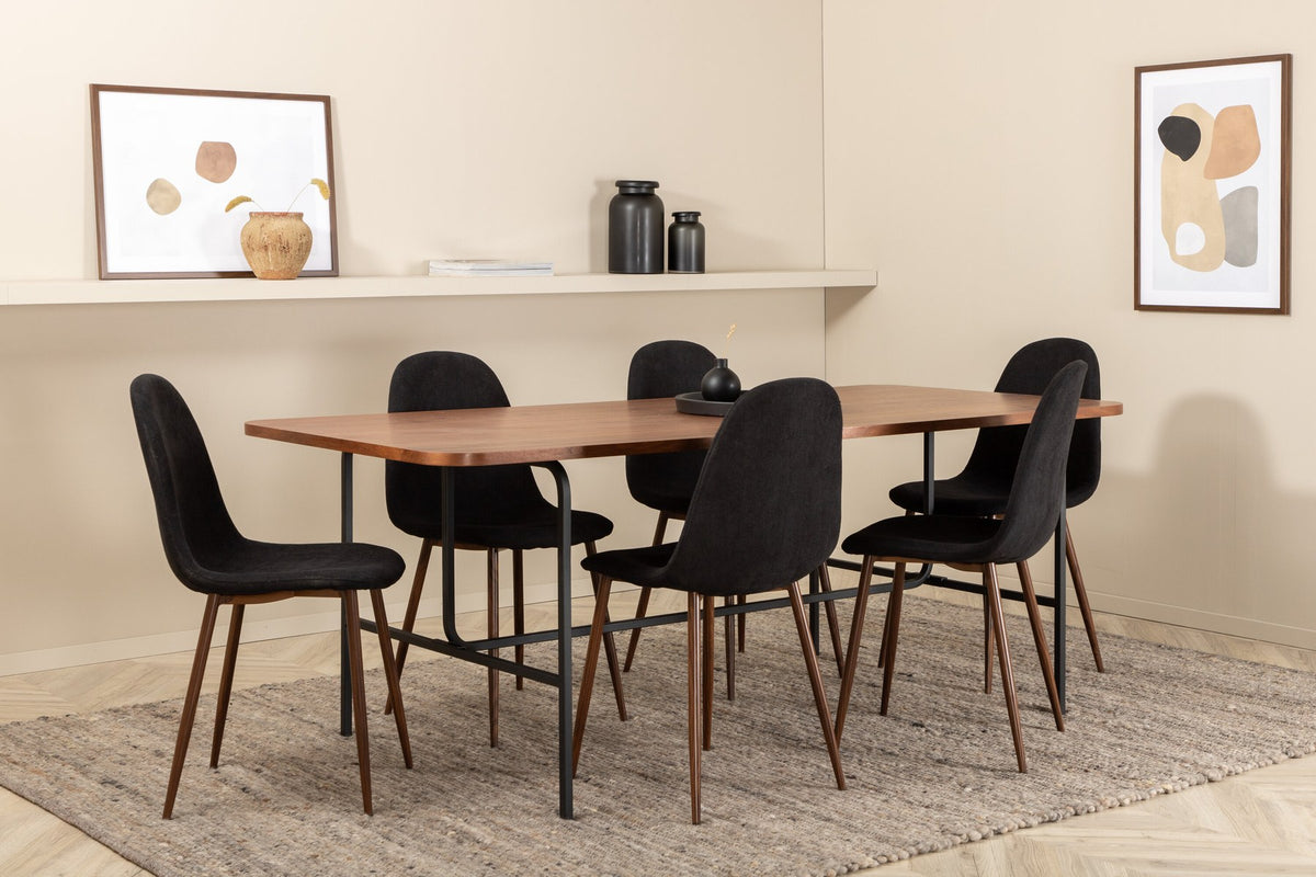 Rechteckiger Esstisch mit Nussbaum-Furnierplatte aus MDF und schwarzem Stahluntergestell, umgeben von sechs gepolsterten Polar Stühlen mit schwarzem Polyesterbezug.