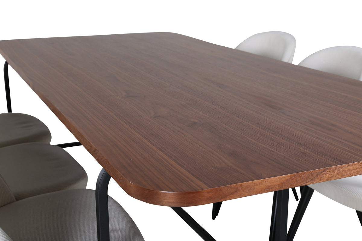 Rechteckiger Esstisch mit Nussbaum-MDF-Platte und Stahlgestell, kombiniert mit Esszimmerstühlen mit Creme Polyester-Cord-Bezug und Stahlbeinen.