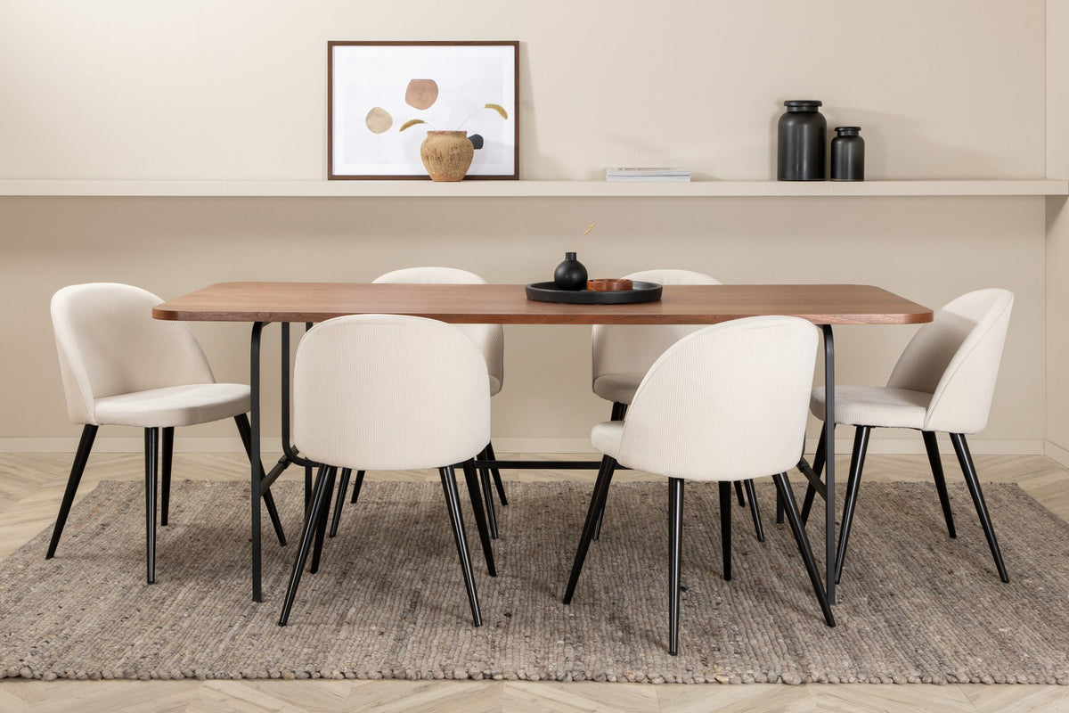Rechteckiger Esstisch mit Nussbaum-MDF-Platte und Stahlgestell, kombiniert mit Esszimmerstühlen mit Creme Polyester-Cord-Bezug und Stahlbeinen.