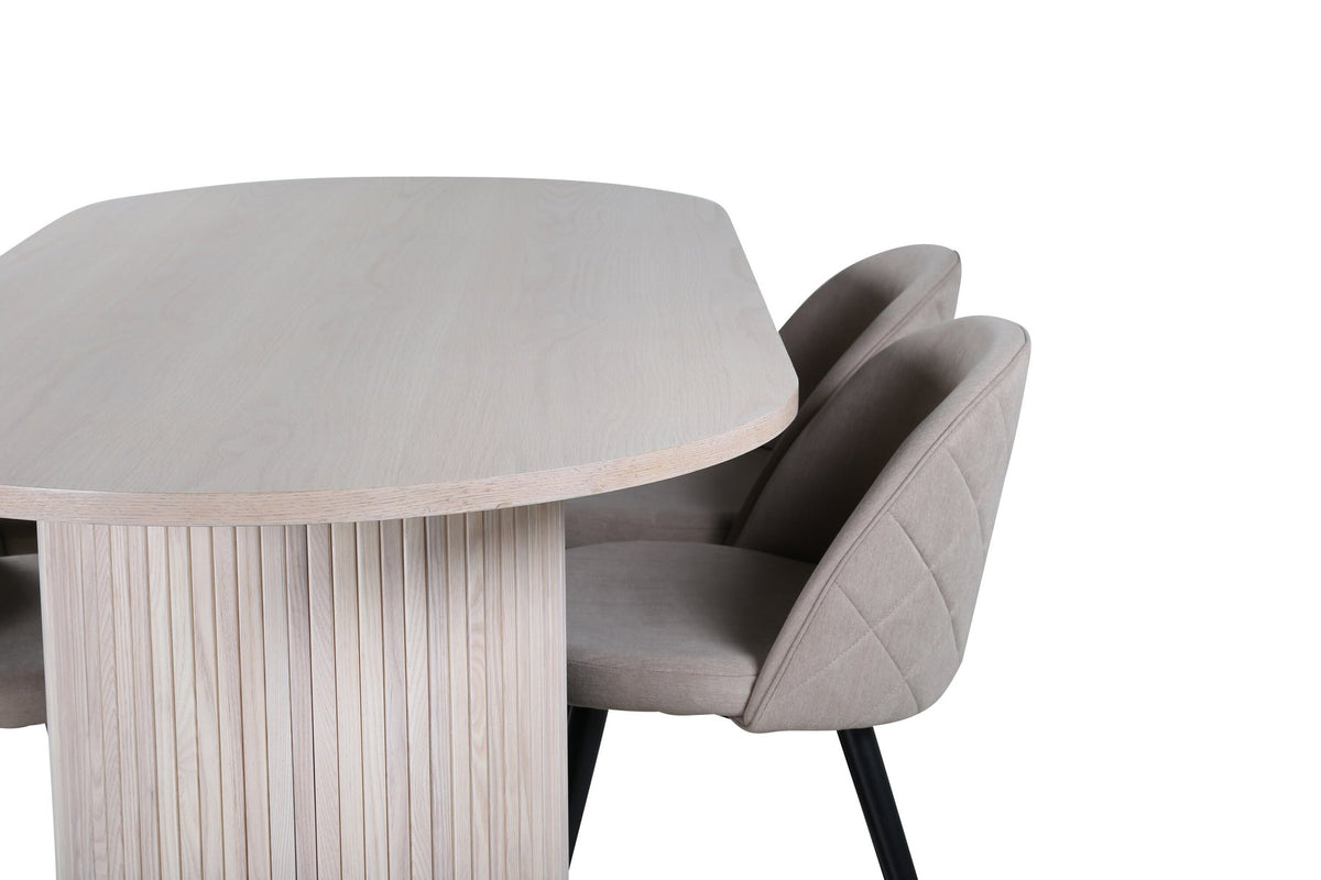 Ovaler Esstisch mit weiss gewaschenem schwarzem Furnier und vier Stühlen mit beige-schwarzem Polyester-Leinen-Bezug und Samtnähten