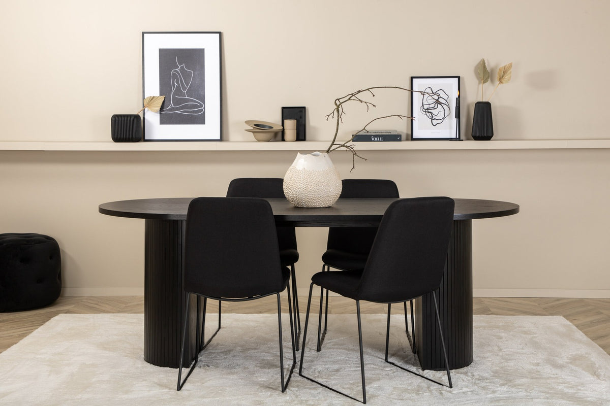 Schwarzes Bartischset Bianca mit vier Muce-Stühlen, Tischplatte aus MDF mit Furnier, Stuhlbeine aus schwarzem Metall, Sitz aus Polyester.