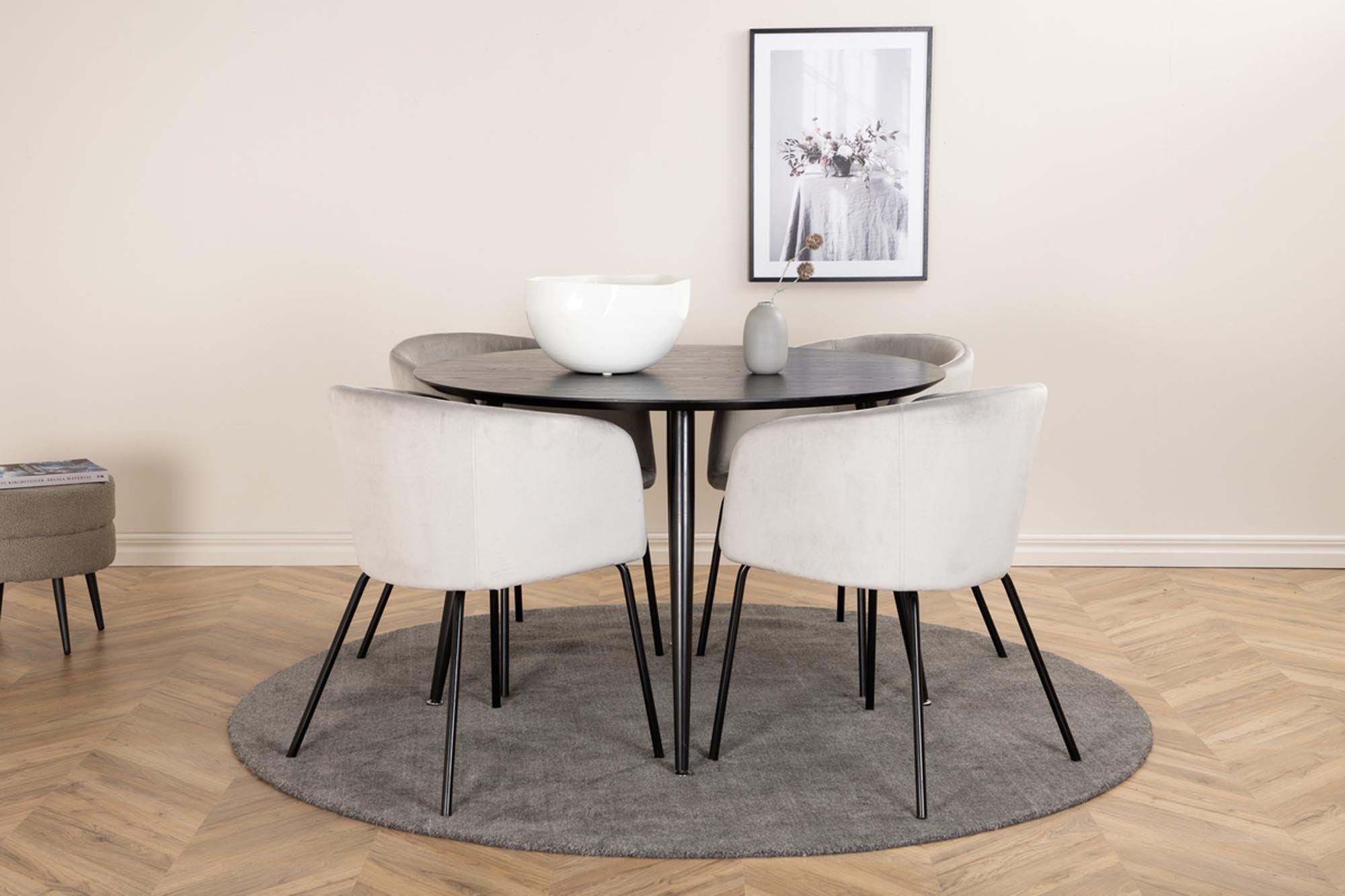 Elegantes Dipp Esszimmerset mit runden Tisch und 4 bequemen Berit Stühlen. Perfekte Kombination aus Stil und Komfort für Ihr Esszimmer.
