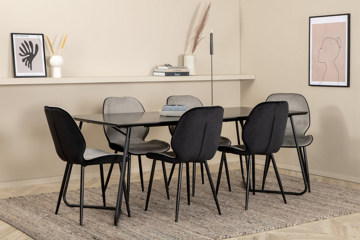 Esszimmerset Emma & Petra von Venture Home: rechteckiger Tisch aus MDF mit Furnier in Schwarz und zwei Stühle mit Bugholzgestell in Grau.