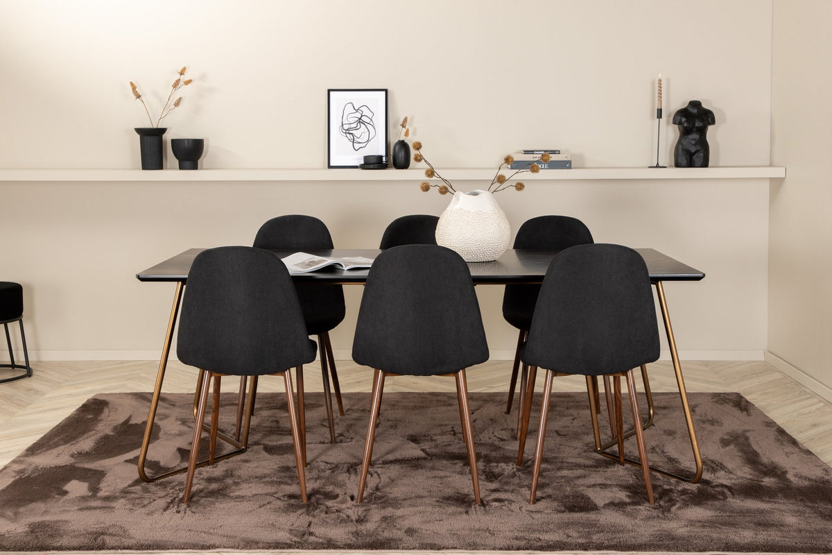 Esszimmerset Petra + Polar: schwarzer Tisch mit MDF-Furnierplatte auf Stahlbeinen, sechs Stühle mit Samt-Sitzkissen und Bugholzbeinen.