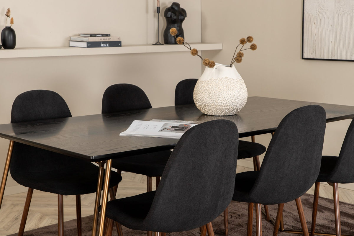 Esszimmerset Petra + Polar: schwarzer Tisch mit MDF-Furnierplatte auf Stahlbeinen, sechs Stühle mit Samt-Sitzkissen und Bugholzbeinen.