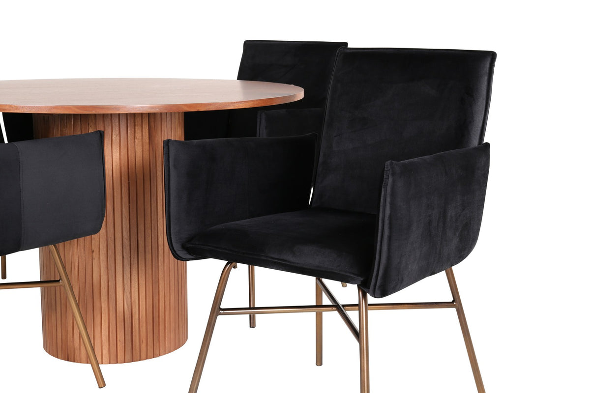 Rundes Esszimmerset mit Nussbaum-Tischplatte Ø110cm aus MDF und vier schwarzen Stühlen mit Samtsitz und Beinen aus Eisen.