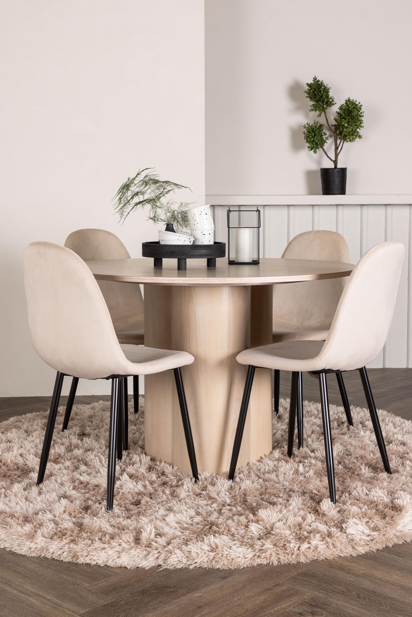 Stilvolles Esszimmer Set mit runder Tischplatte und 4 gepolsterten Samt-Stühlen. Ideal für gemütliche Abende und modernes Wohnen.