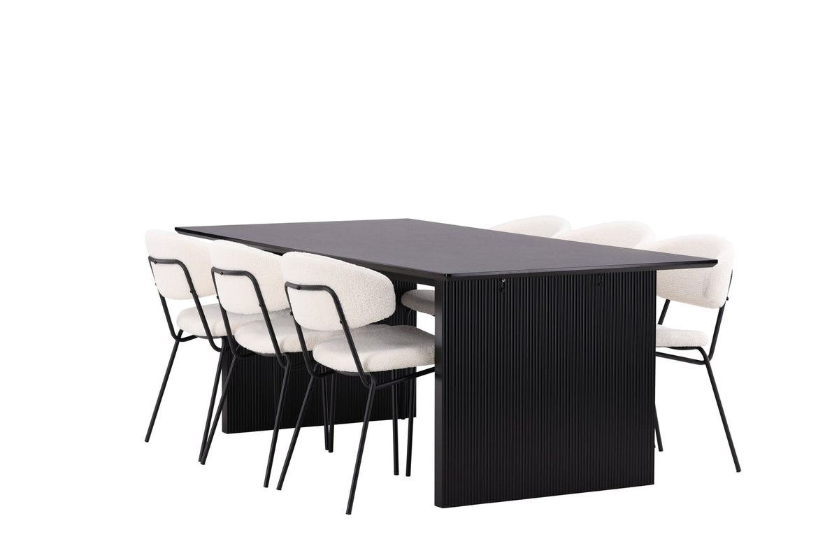 Esszimmerset aus rechteckigem MDF-Tisch in Rauchschwarz mit sechs Limhamn-Stühlen, beiger Samtbezug, muschelförmige Rückenlehne, schwarze Metallbeine.