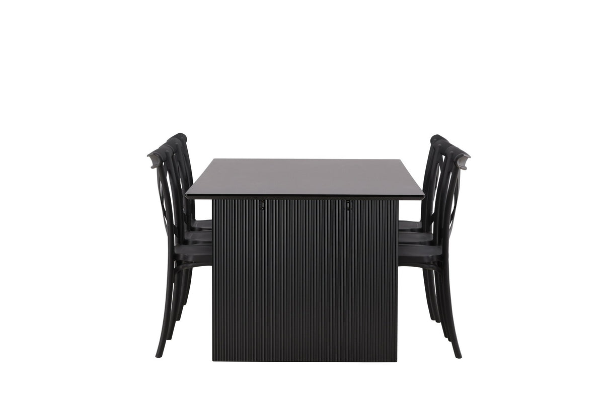 Esszimmerset aus rechteckigem MDF-Tisch in Rauchschwarz mit sechs Limhamn-Stühlen, beiger Samtbezug, muschelförmige Rückenlehne, schwarze Metallbeine.