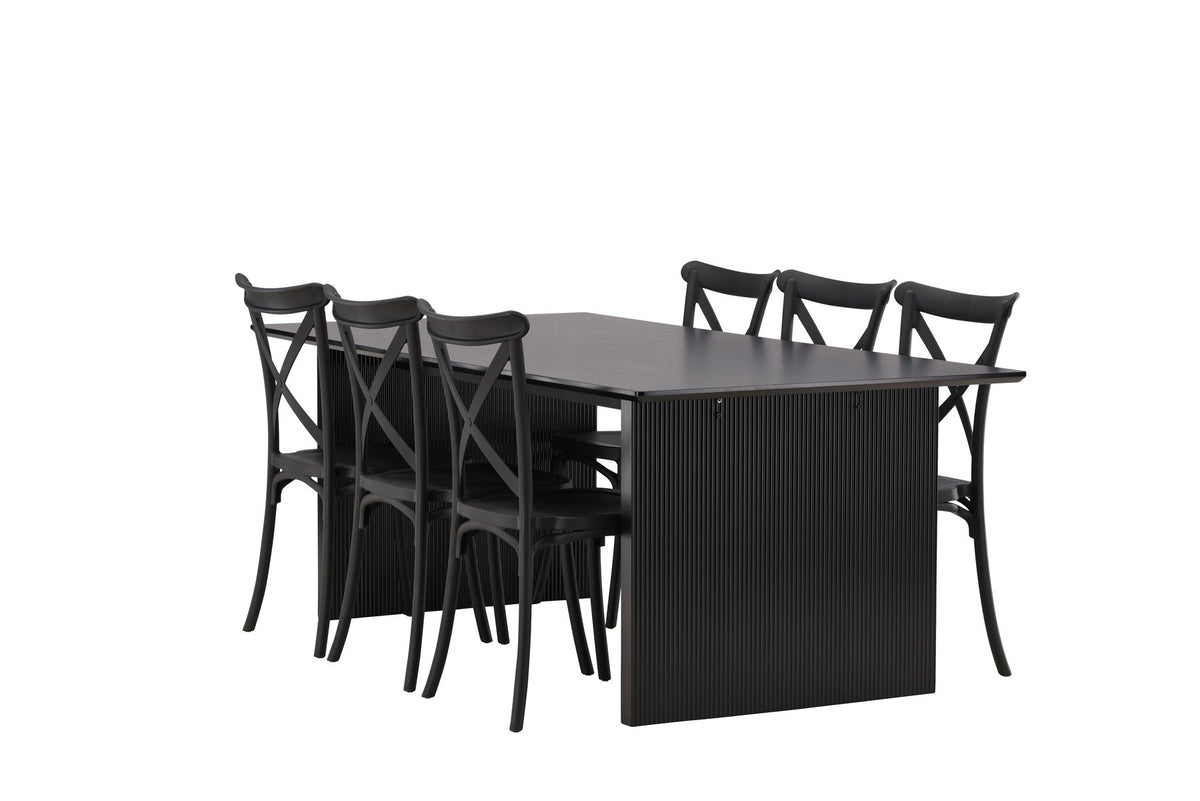 Esszimmerset aus rechteckigem MDF-Tisch in Rauchschwarz mit sechs Limhamn-Stühlen, beiger Samtbezug, muschelförmige Rückenlehne, schwarze Metallbeine.