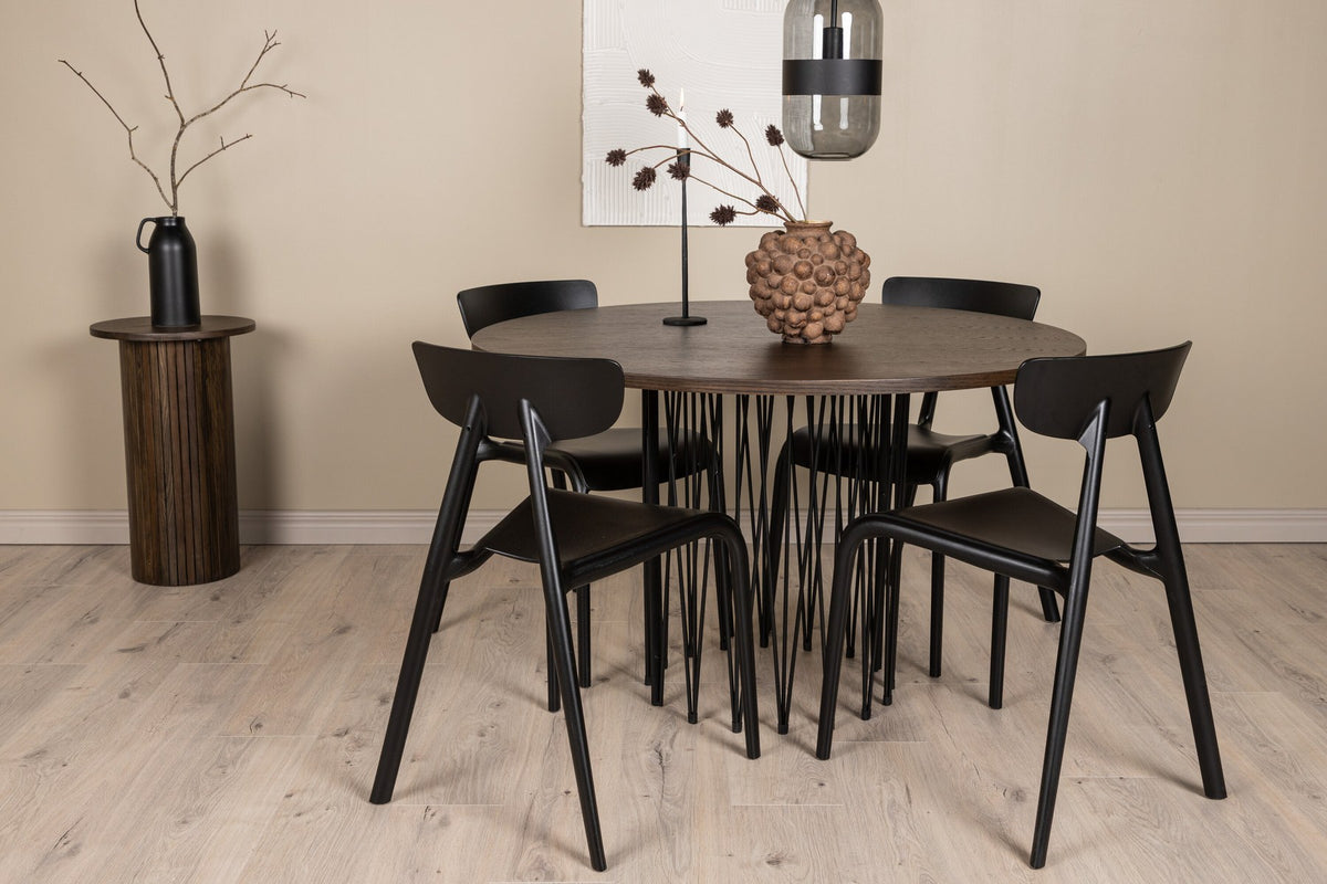 Rundes Esszimmerset mit Steinlook-Tisch aus MDF und Mocca-Furnier, schwarzem Metallgestell und vier Limhamn-Stühlen mit beigem Samtbezug.