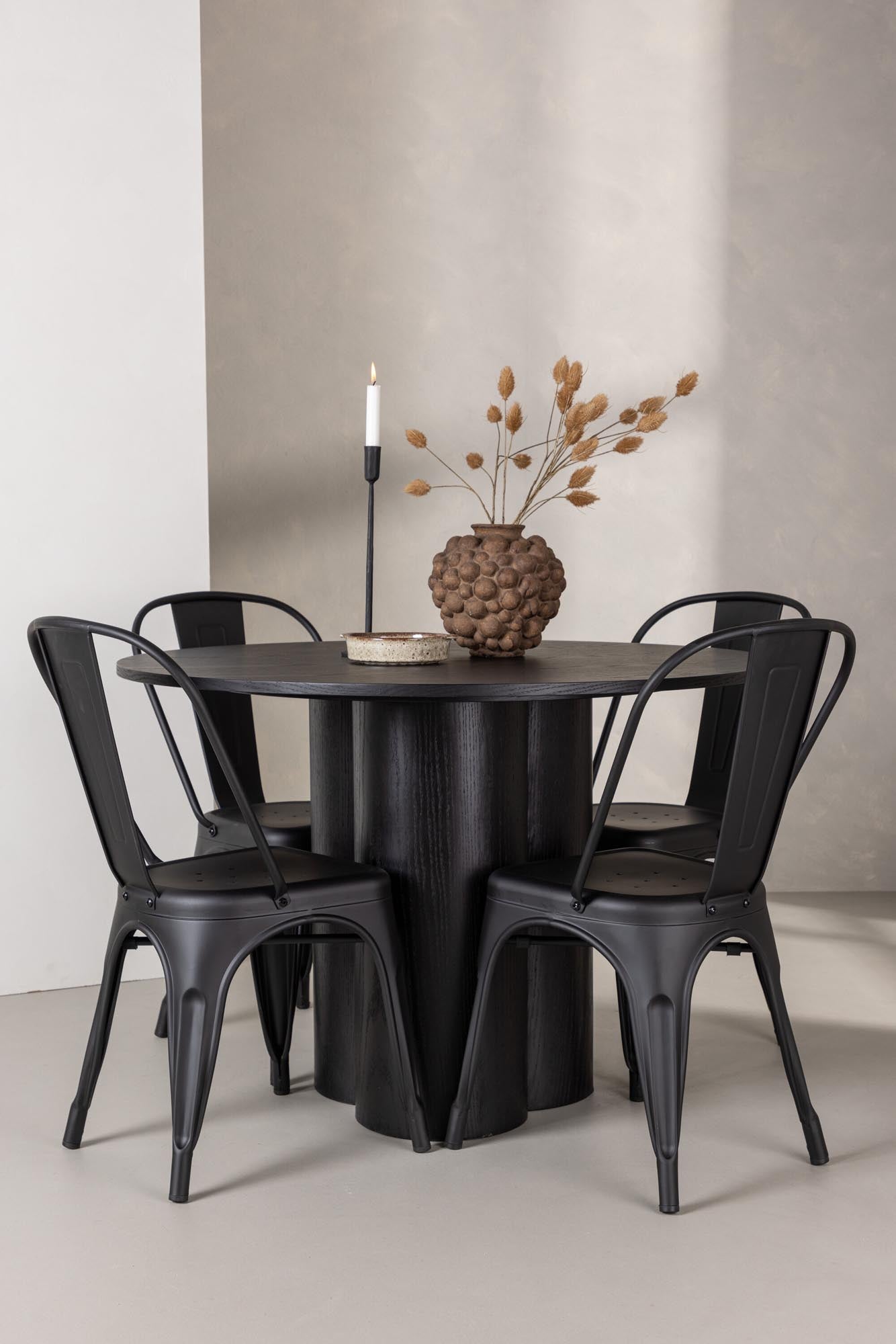 Stilvolles Olivia Esszimmer Set: Eleganter Tisch mit schwarzer MDF-Platte, robuste Stahlbeine und komfortable Tempe-Stühle aus Metall und Holz.