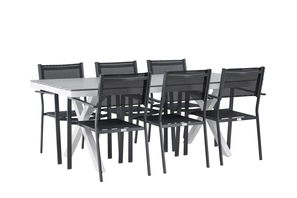 Rechteckiger Gartentisch Garcia mit Aluminiumgestell und Aintwood-Platte, umgeben von sechs stapelbaren Copacabana-Stühlen mit Textilene-Sitzfläche.