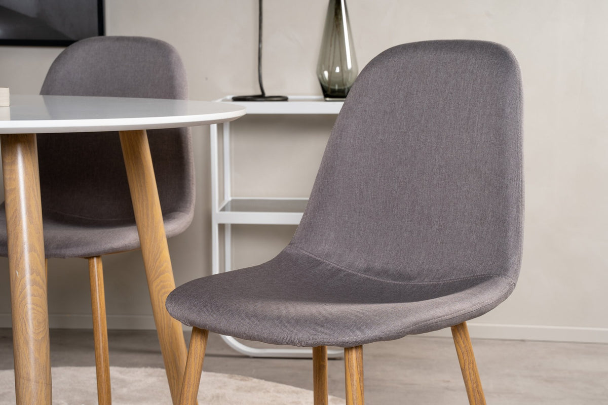 Esszimmerset Plaza mit Tisch aus MDF und Stahlgestell sowie vier Stühlen Polar in Weiss/Grau/Weiss, Ansicht des kompletten Sets.