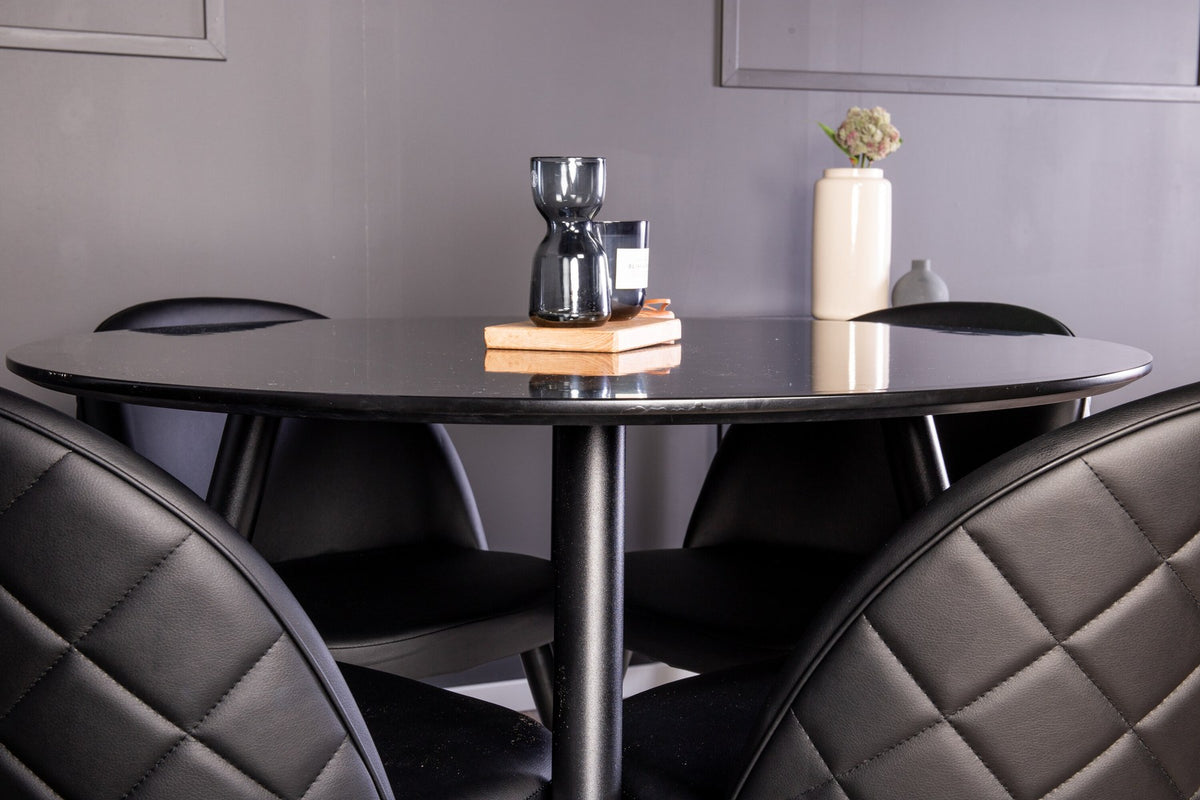 Esszimmer Set Plaza mit Stuhl Velvet von Venture Home: Esstisch aus MDF mit Stahlgestell in Schwarz, dazu vier gepolsterte Stühle.
