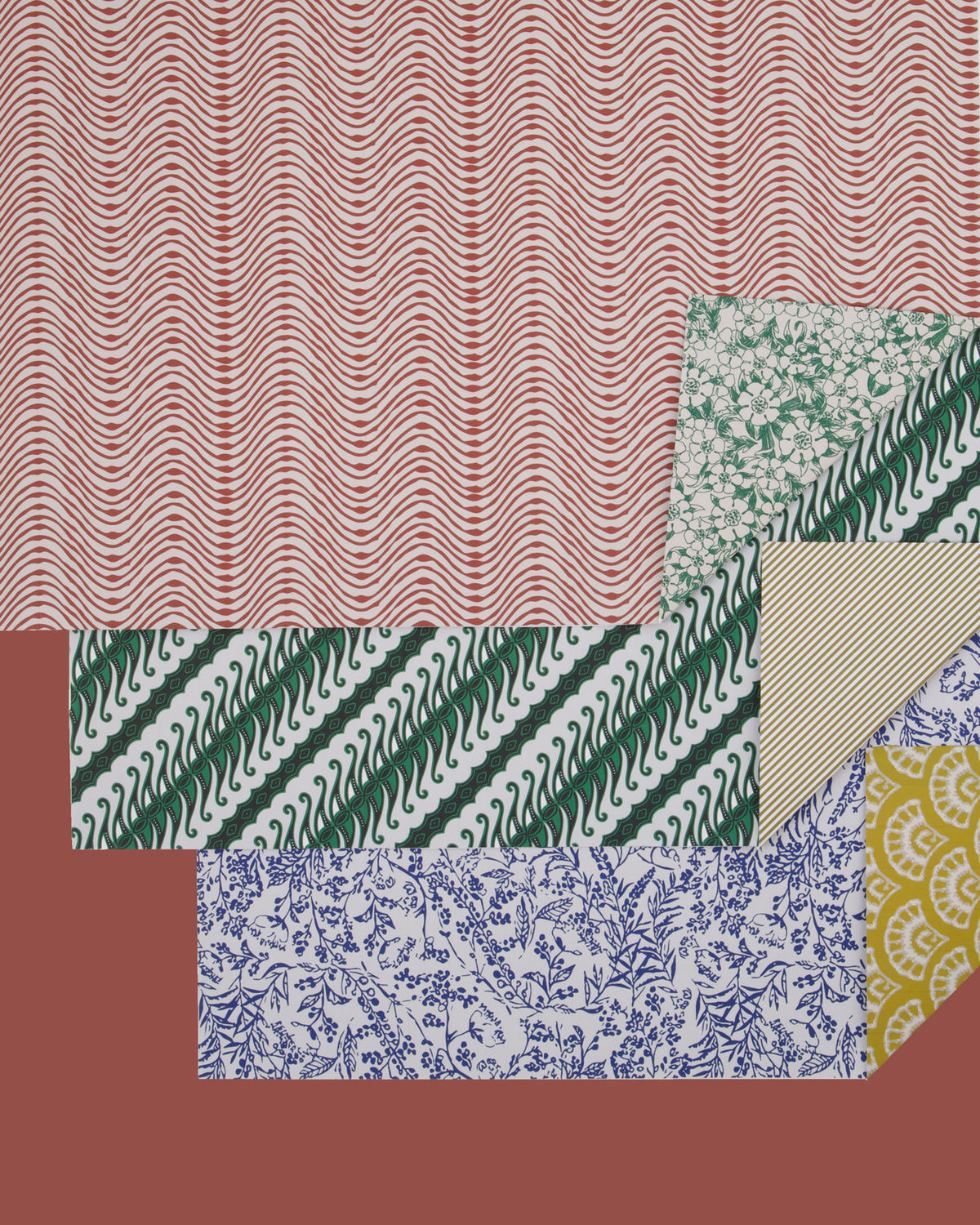 Drei Rollen Geschenkpapier HDWrap in Bunt mit unterschiedlichen Mustern, aus Papier