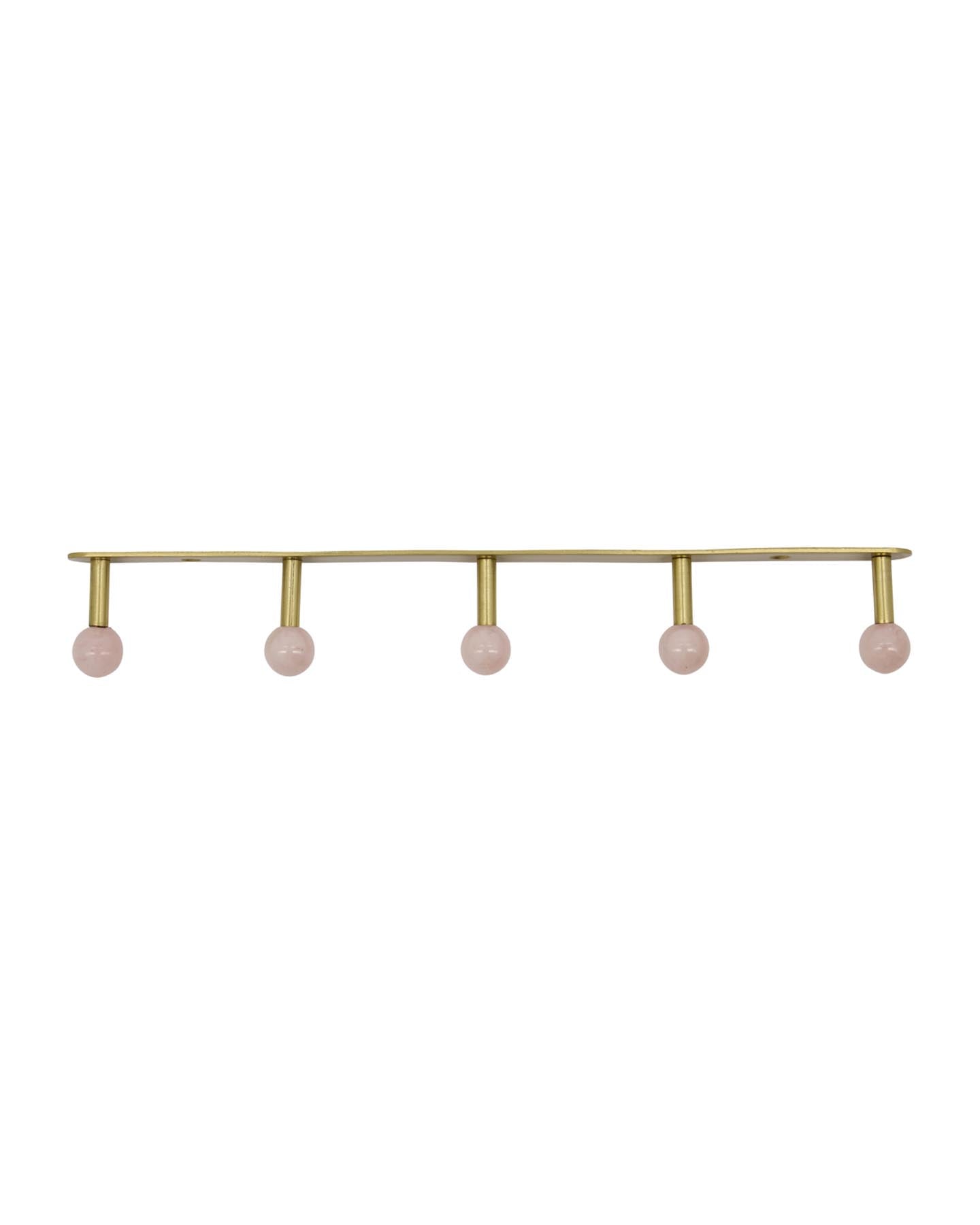 Verleihen Sie Ihrem Zuhause mit dem handgefertigten Rack HDBall in sanftem Rosé von House Doctor einen Hauch von Eleganz und praktischer Ordnung.