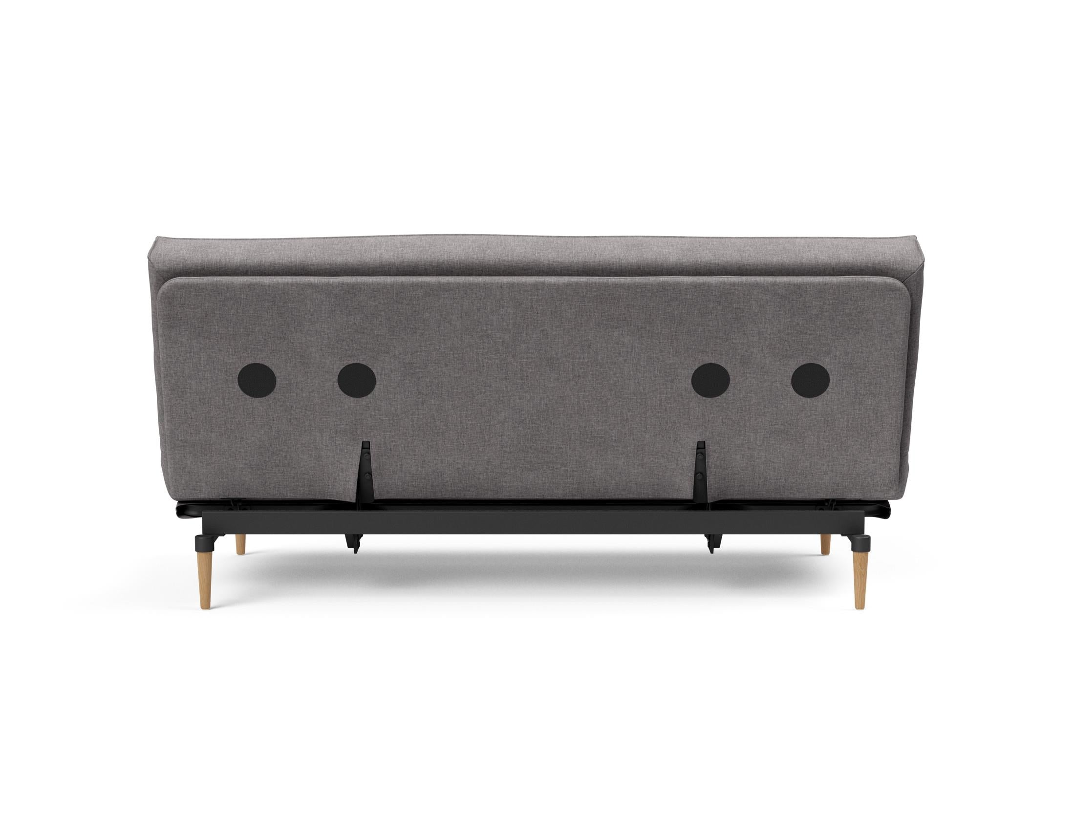 Erleben Sie das Colpus Bettsofa 140 Sharp Plus mit Soft Spring Bezug – stilvoll, funktional und ideal für kleine Räume, verwandelt sich schnell in ein gemütliches Bett.