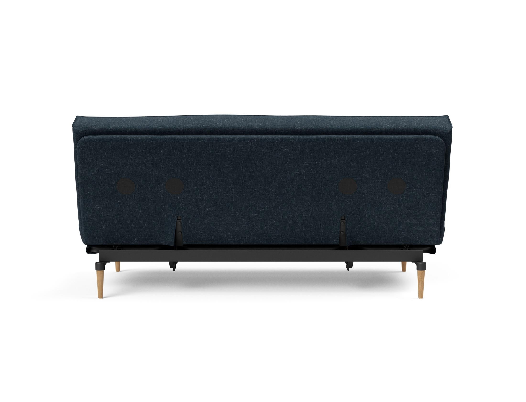 Erleben Sie das Colpus Bettsofa 140 Sharp Plus mit Soft Spring Bezug – stilvoll, funktional und ideal für kleine Räume, verwandelt sich schnell in ein gemütliches Bett.