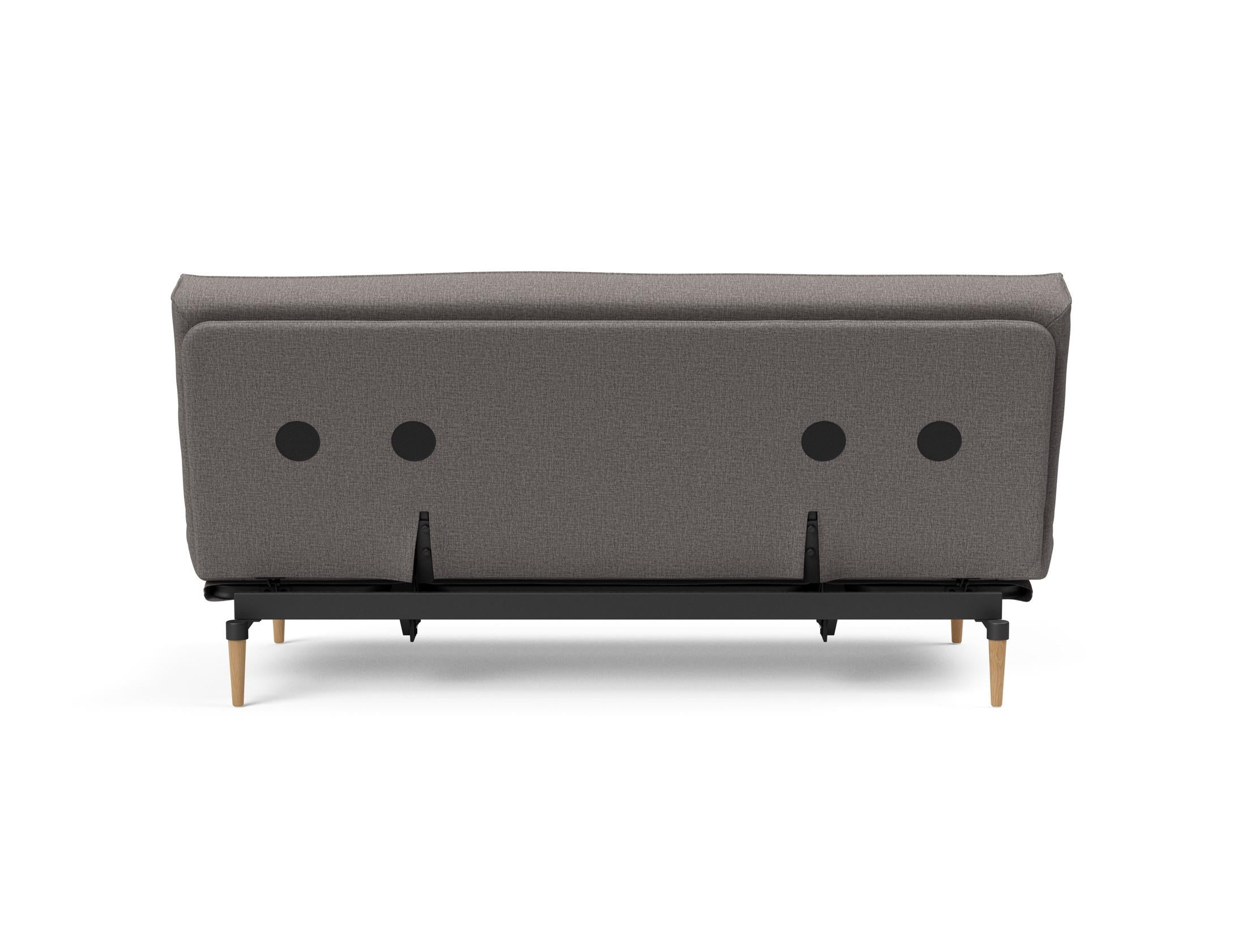 Erleben Sie das Colpus Bettsofa 140 Sharp Plus mit Soft Spring Bezug – stilvoll, funktional und ideal für kleine Räume, verwandelt sich schnell in ein gemütliches Bett.