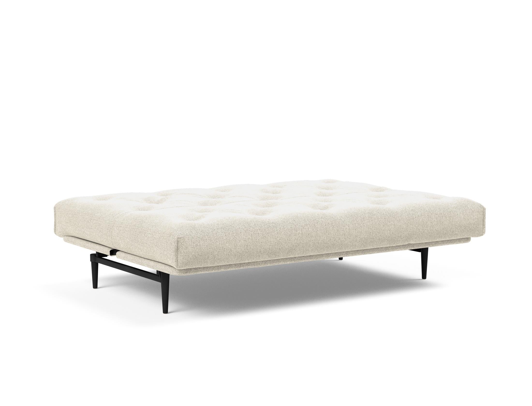 Erleben Sie das Colpus Bettsofa 140 in elegantem Nordic Eiche schwarz. Der Soft Spring Bezug vereint modernen Stil mit optimalem Sitzkomfort.