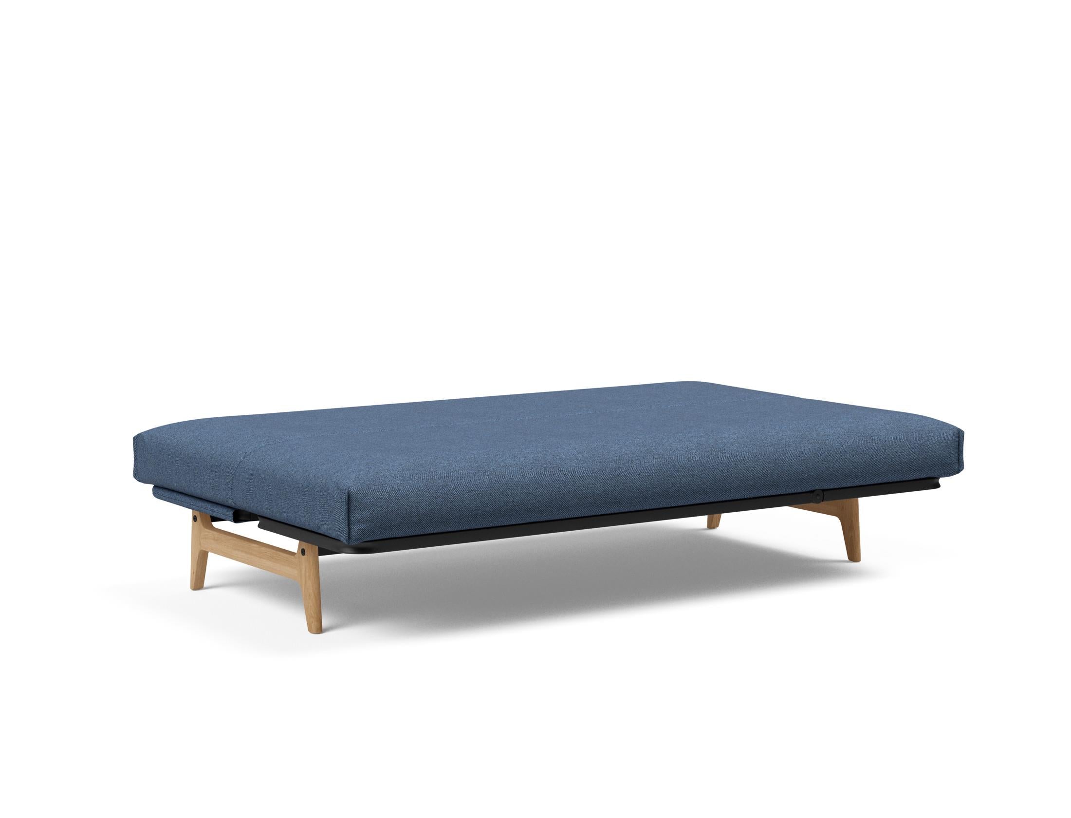 Aslak 120 Bettsofa Nordic Cover: Elegantes Sofa mit Soft Spring Federung, perfekt für entspannte Abende und stilvolle Einrichtung.
