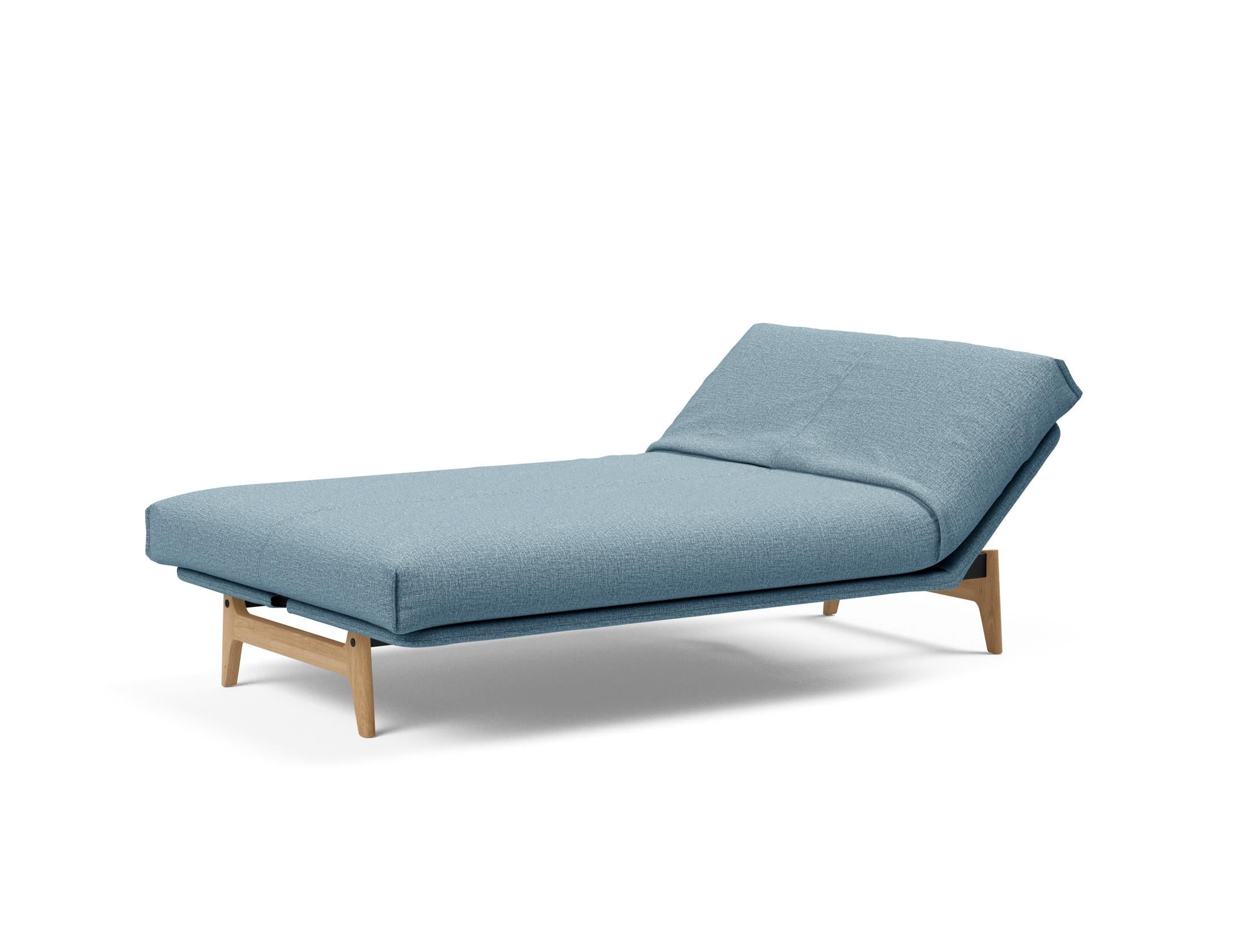 Aslak 120 Bettsofa Nordic Cover: Elegantes Sofa mit Soft Spring Federung, perfekt für entspannte Abende und stilvolle Einrichtung.