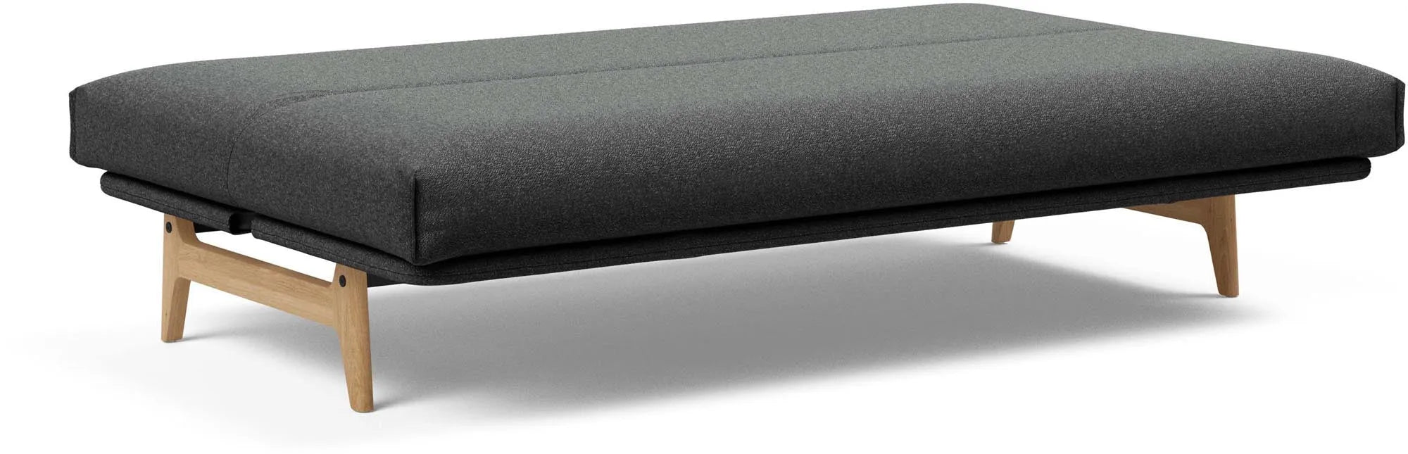 Entdecken Sie das Aslak 120 Bettsofa mit Nordic Cover von Innovation Living – stilvoll, platzsparend und perfekt für Gästeübernachtungen.