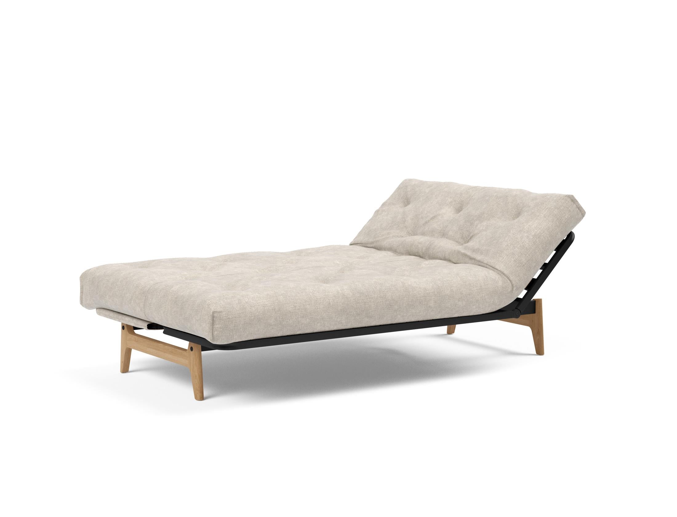 Aslak 120 Bettsofa Nordic: Elegantes Sofa mit Soft Spring Bezug, ideal für gemütliche Nächte und stilvolle Wohnräume.