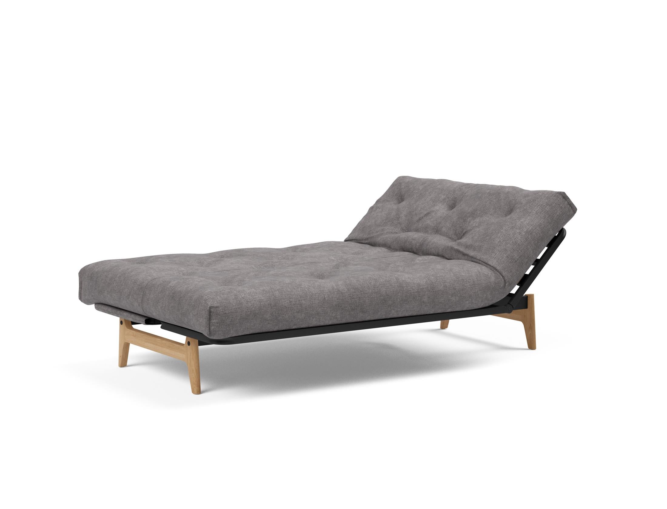 Aslak 120 Bettsofa Nordic: Elegantes Sofa mit Soft Spring Bezug, ideal für gemütliche Nächte und stilvolle Wohnräume.