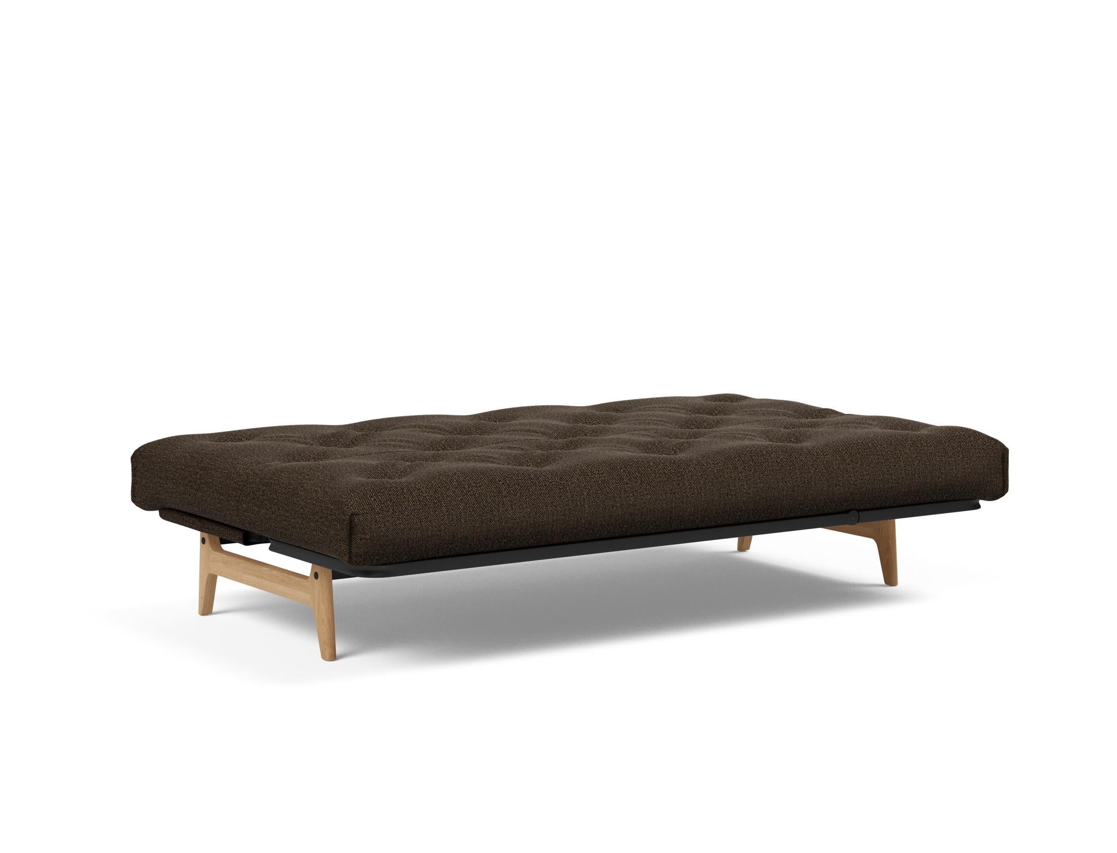 Aslak 120 Bettsofa Nordic: Elegantes Sofa mit Soft Spring Bezug, ideal für gemütliche Nächte und stilvolle Wohnräume.