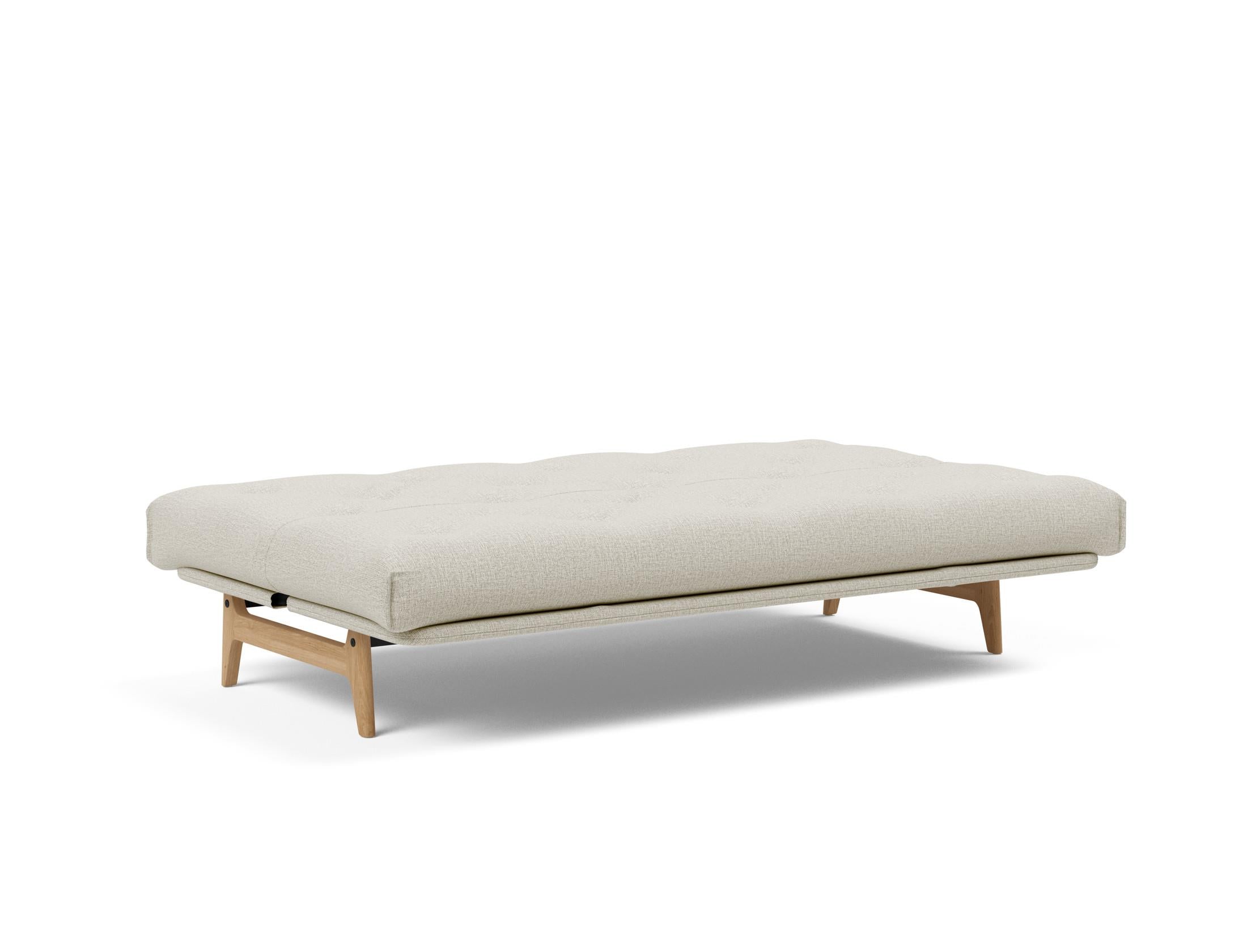 Aslak 120 Bettsofa Nordic: Elegantes Sofa mit Soft Spring Bezug, ideal für gemütliche Nächte und stilvolle Wohnräume.