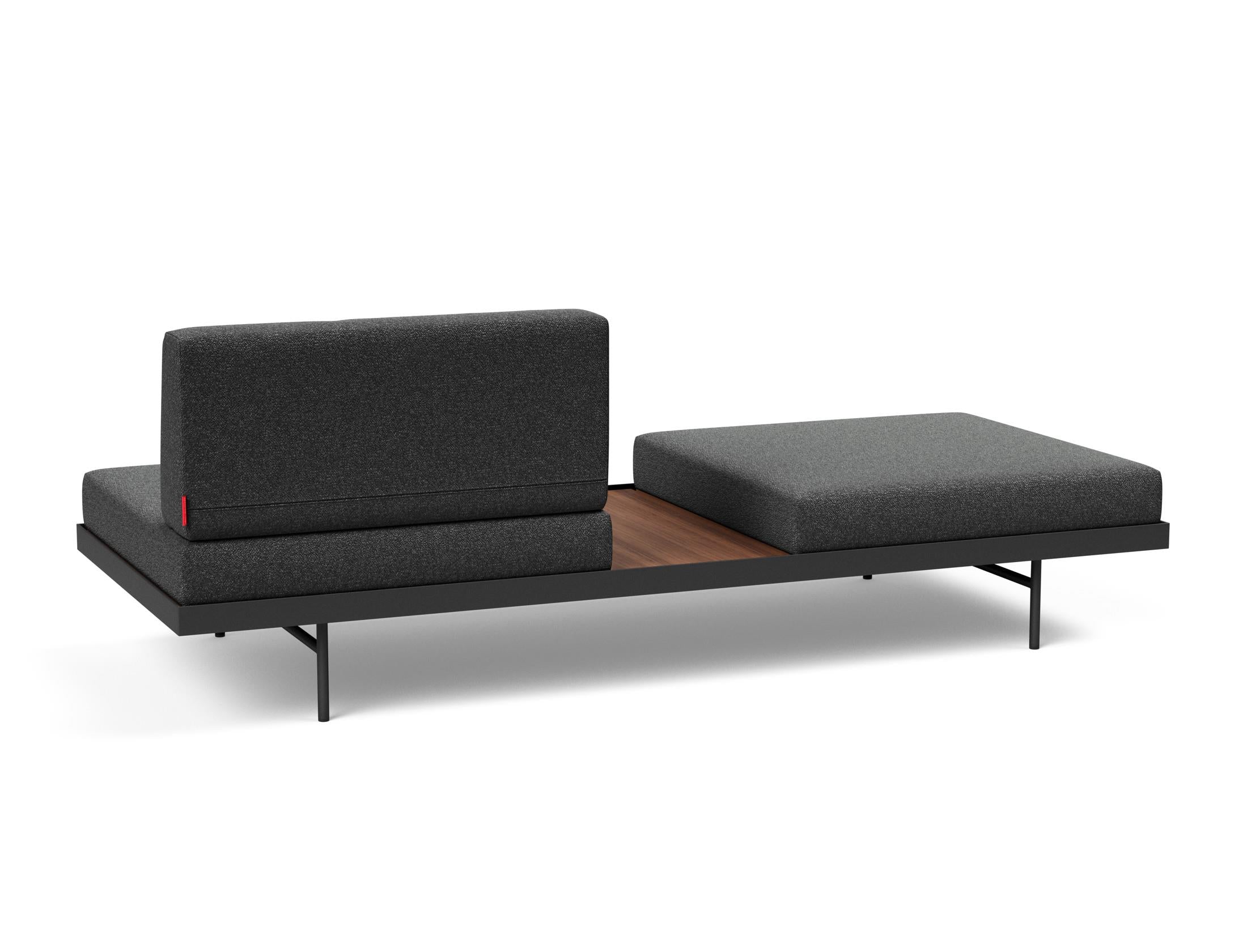 Erleben Sie das Puri Klappsofa von Innovation Living – stilvolles Design trifft Funktionalität mit integriertem Tisch für jeden Raum.