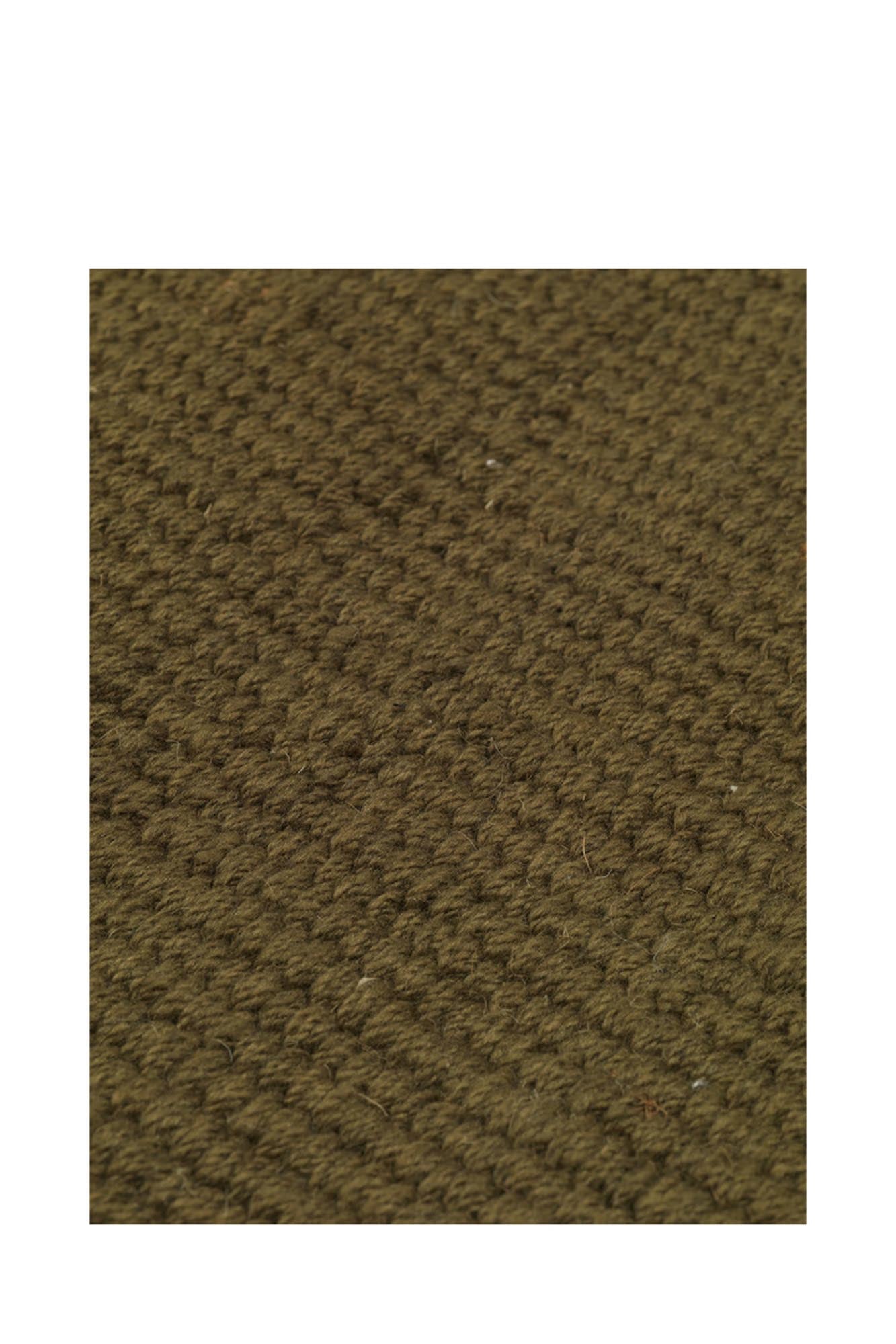 Eleganter Ferm Living Block-Teppich aus recycelten Materialien.