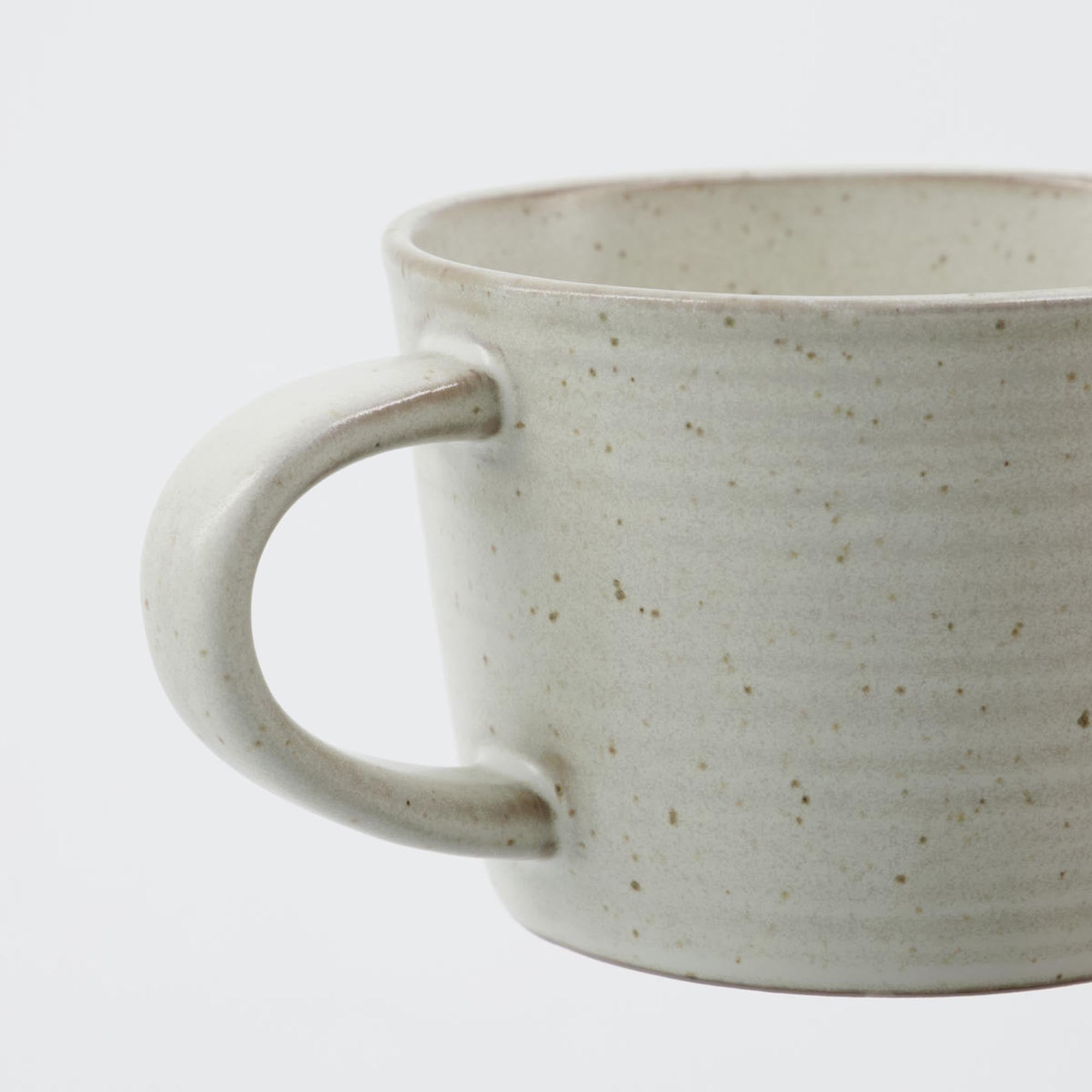 Stilvolle HDPion Tasse mit Untertasse, grau/weiss, von House Doctor.